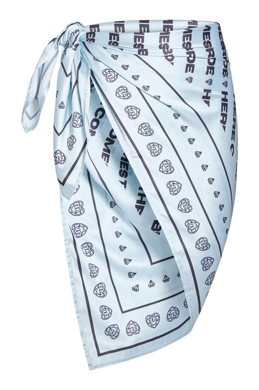 Light blue bridal sarong with 'Here Comes the Bride' all-over print, styled as a cover-up skirt on a ghost mannequin