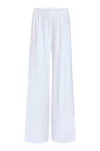 White terry wide-leg pants with BRIDE embroidery at left lower leg, styled on ghost mannequin 
