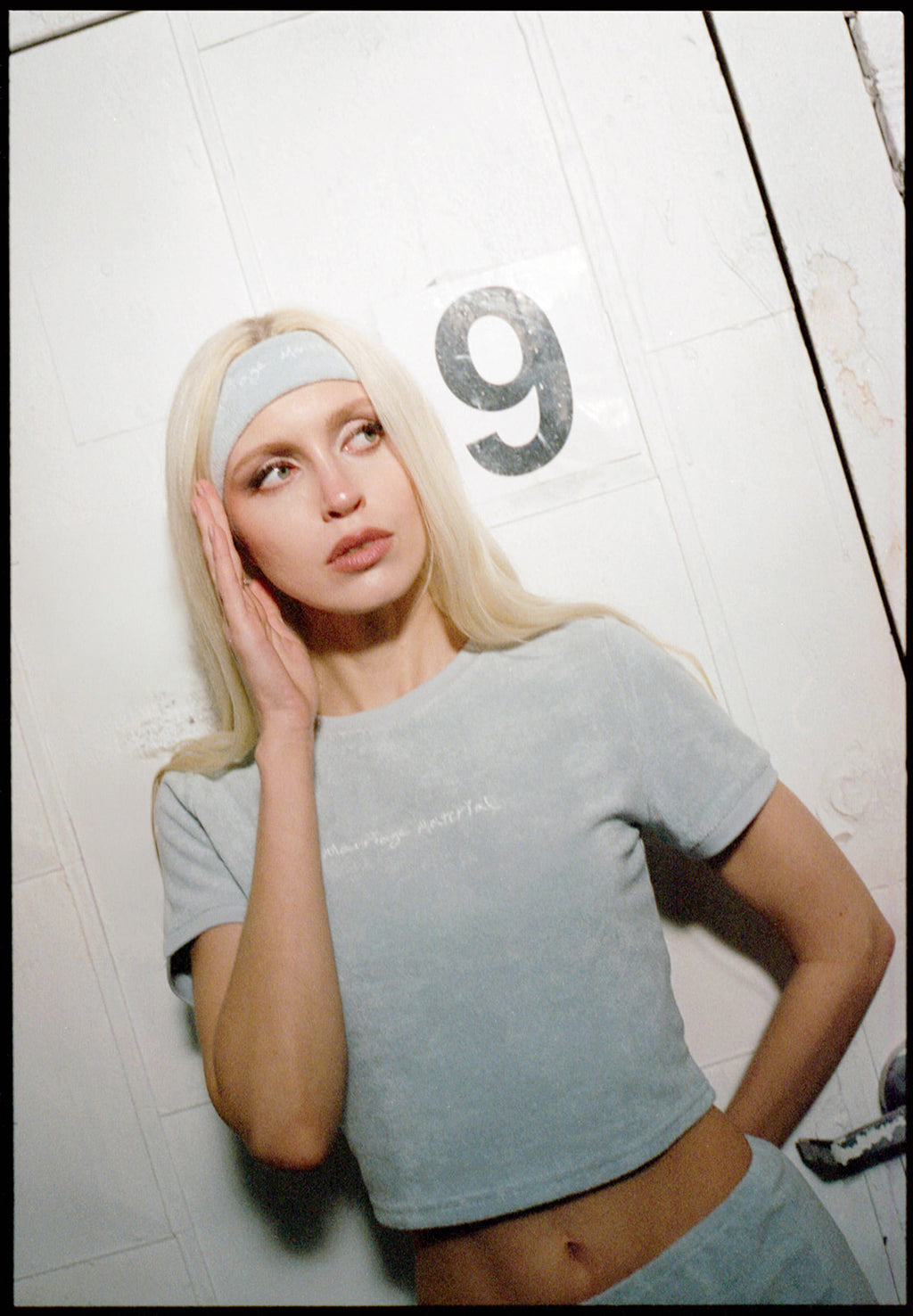 "Marriage Material™" embroidered headband in blue terry, styled on model